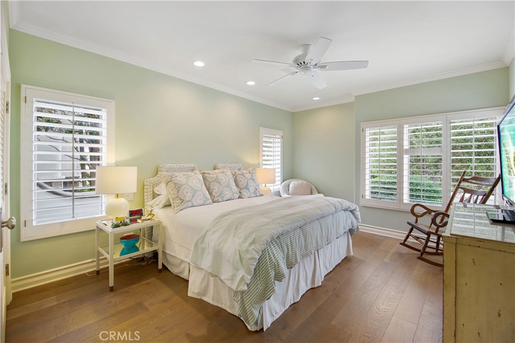 27 Marbella Dana Point, CA 92629 - Photo 25 of 66 a bedroom with a bed couch and a window