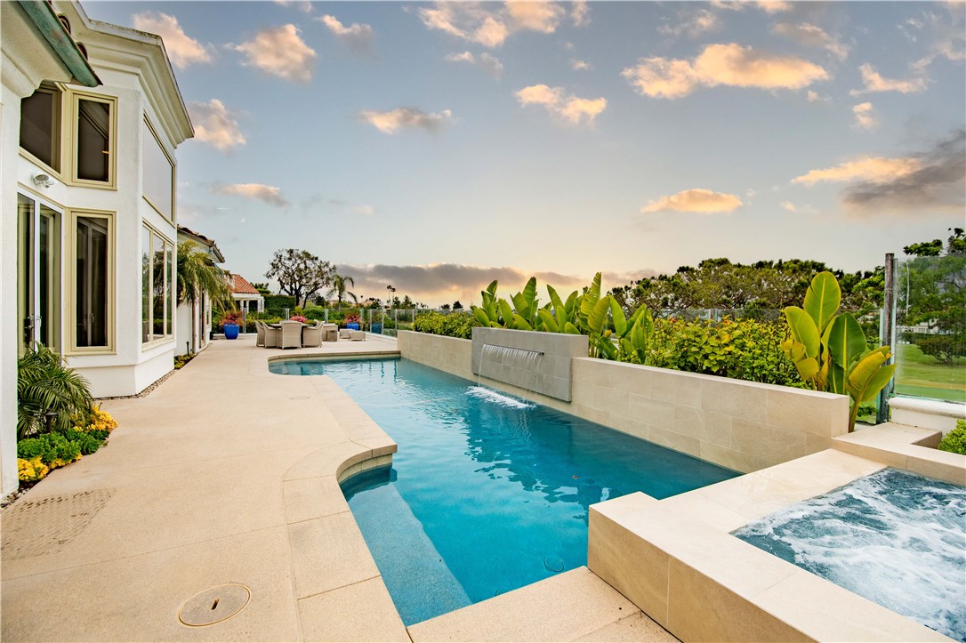 27 Marbella Dana Point, CA 92629 - Photo 36 of 66 a view of a swimming pool with a patio