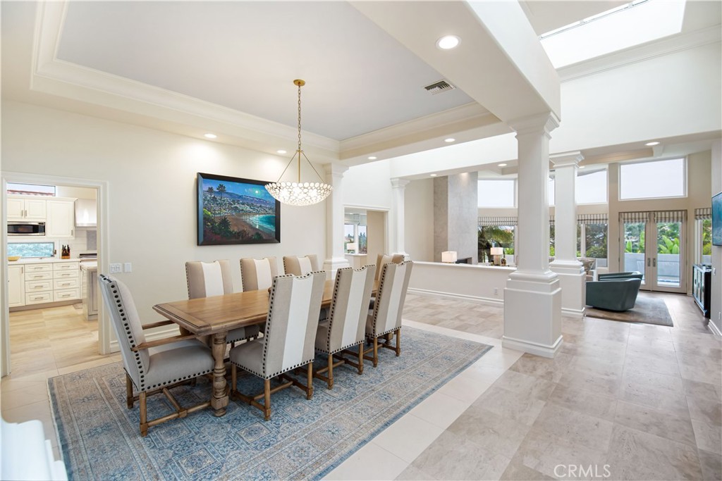 27 Marbella Dana Point, CA 92629 - Photo 53 of 66 a view of a dining room with furniture window and wooden floor