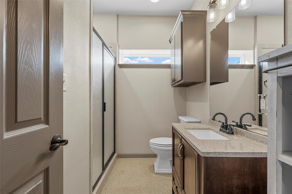 18503 Wortham Bend Road China Spring, TX 76633 - Photo 29 of 40 a bathroom with a sink and mirror