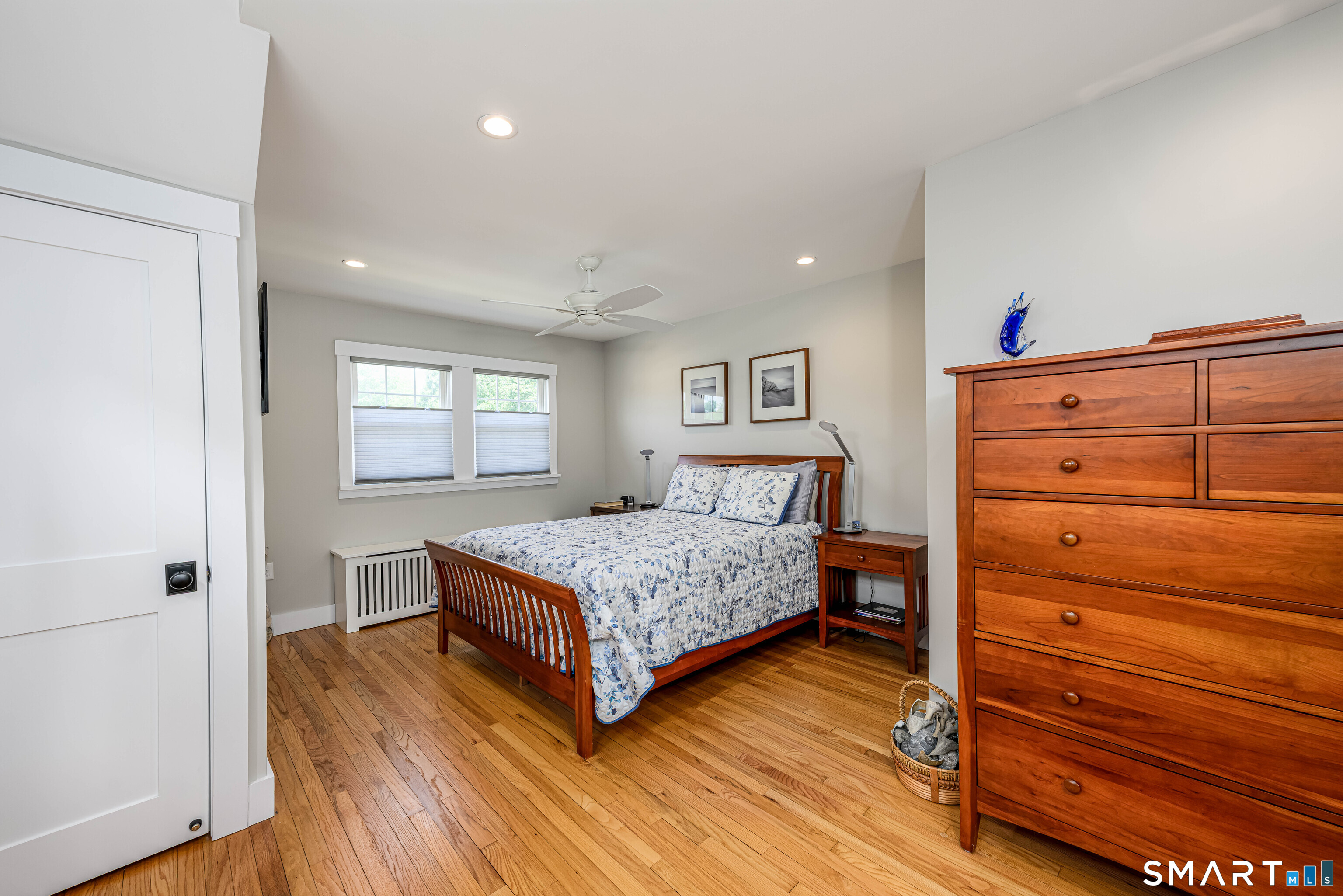 77 Prospect Road East Haven, CT 06512 - Photo 14 of 31 Primary bedroom, wood floors and a split heat/ac system.