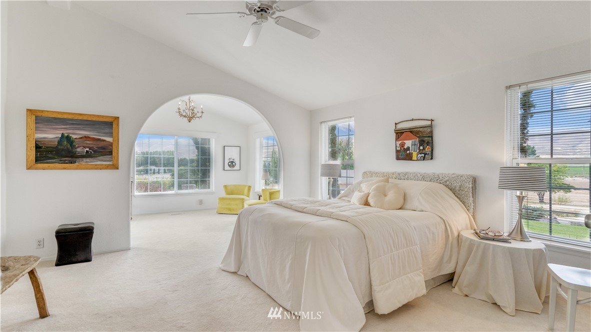175118 West Byron Road Prosser, WA 99350 - Photo 13 of 36 a spacious bedroom with a bed and a large window