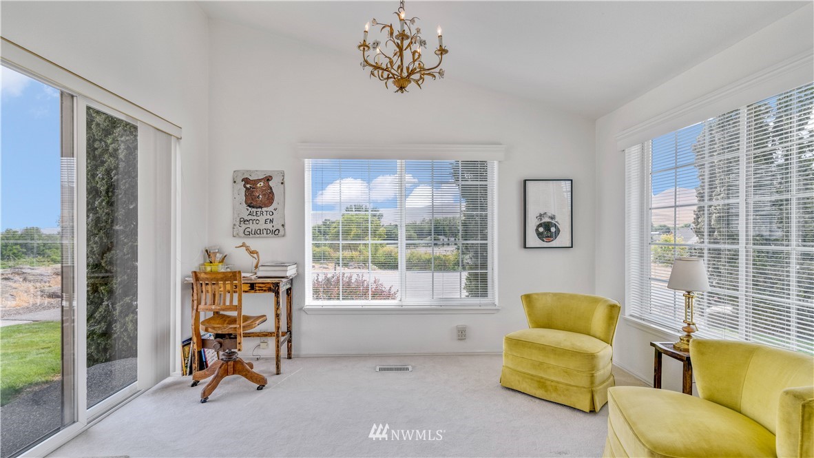 175118 West Byron Road Prosser, WA 99350 - Photo 15 of 36 a living room with furniture and a floor to ceiling window