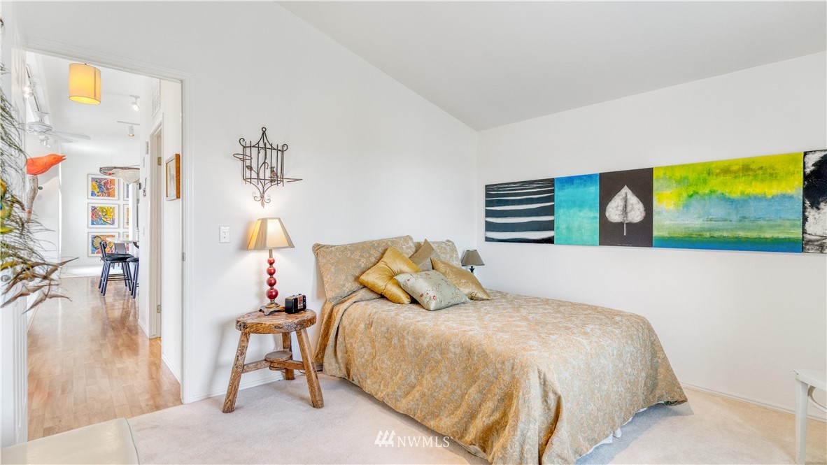 175118 West Byron Road Prosser, WA 99350 - Photo 19 of 36 a bedroom with a bed and a painting on the wall