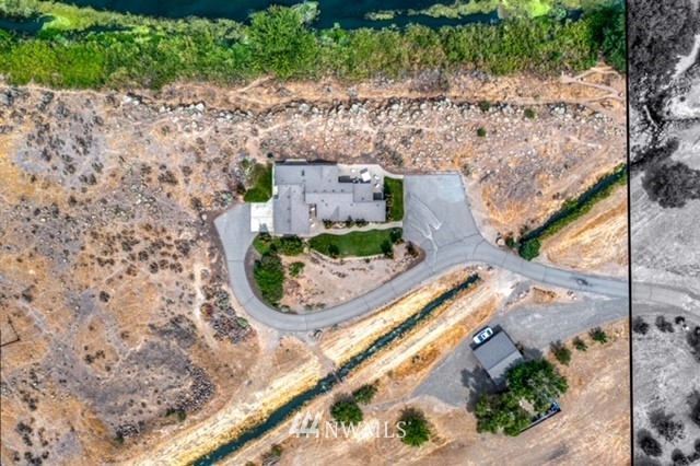 175118 West Byron Road Prosser, WA 99350 - Photo 2 of 36 an aerial view of residential houses with outdoor space