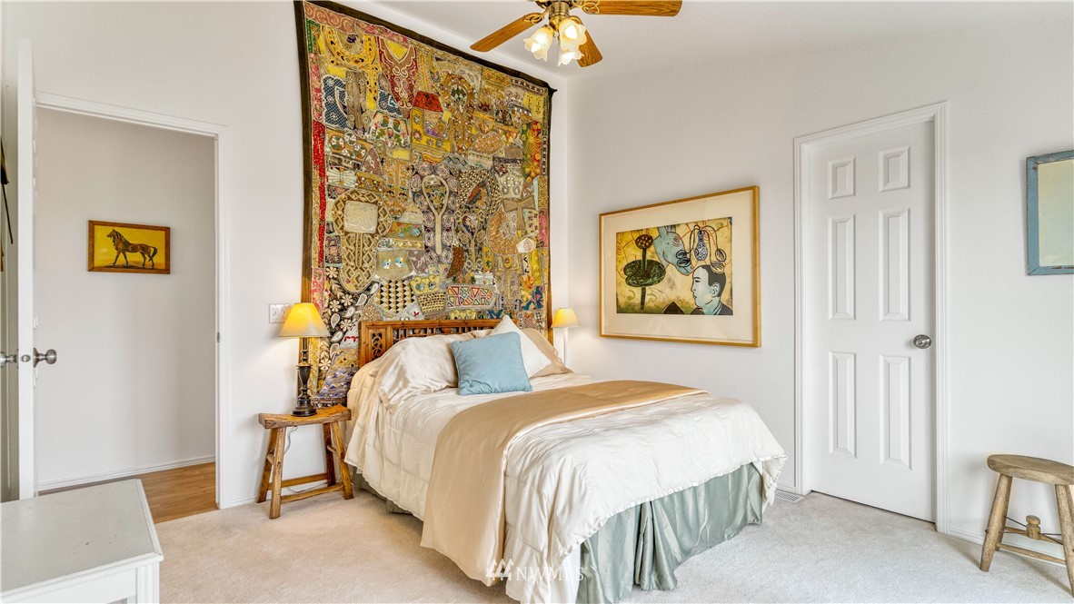 175118 West Byron Road Prosser, WA 99350 - Photo 21 of 36 a bedroom with a bed and a painting on the wall