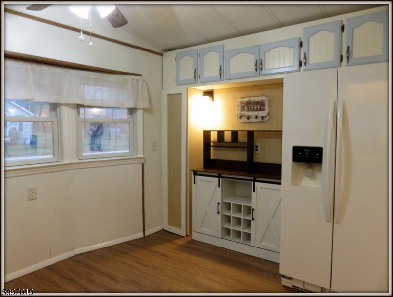 46 Orchard Street, Unit 2 Newton, NJ 07860 - Photo 11 of 18 a view of a projector room with a flat screen tv
