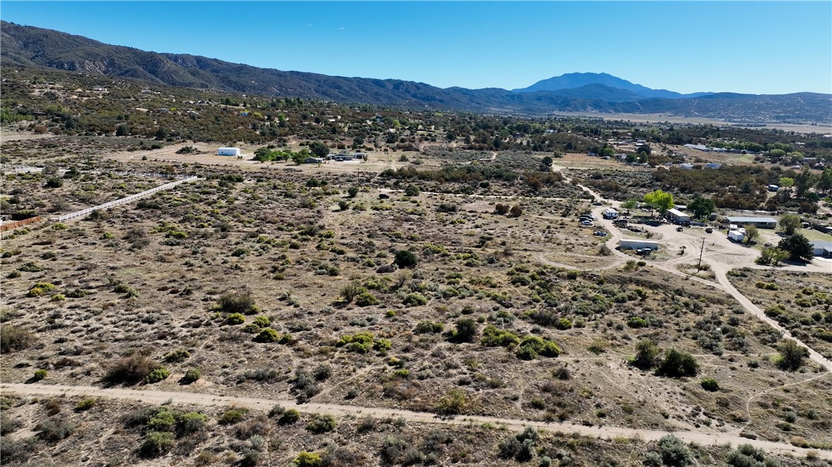 4 Old Forest Road Anza, CA 92539 - Photo 7 of 8 a view of a lush green field with lots of bushes