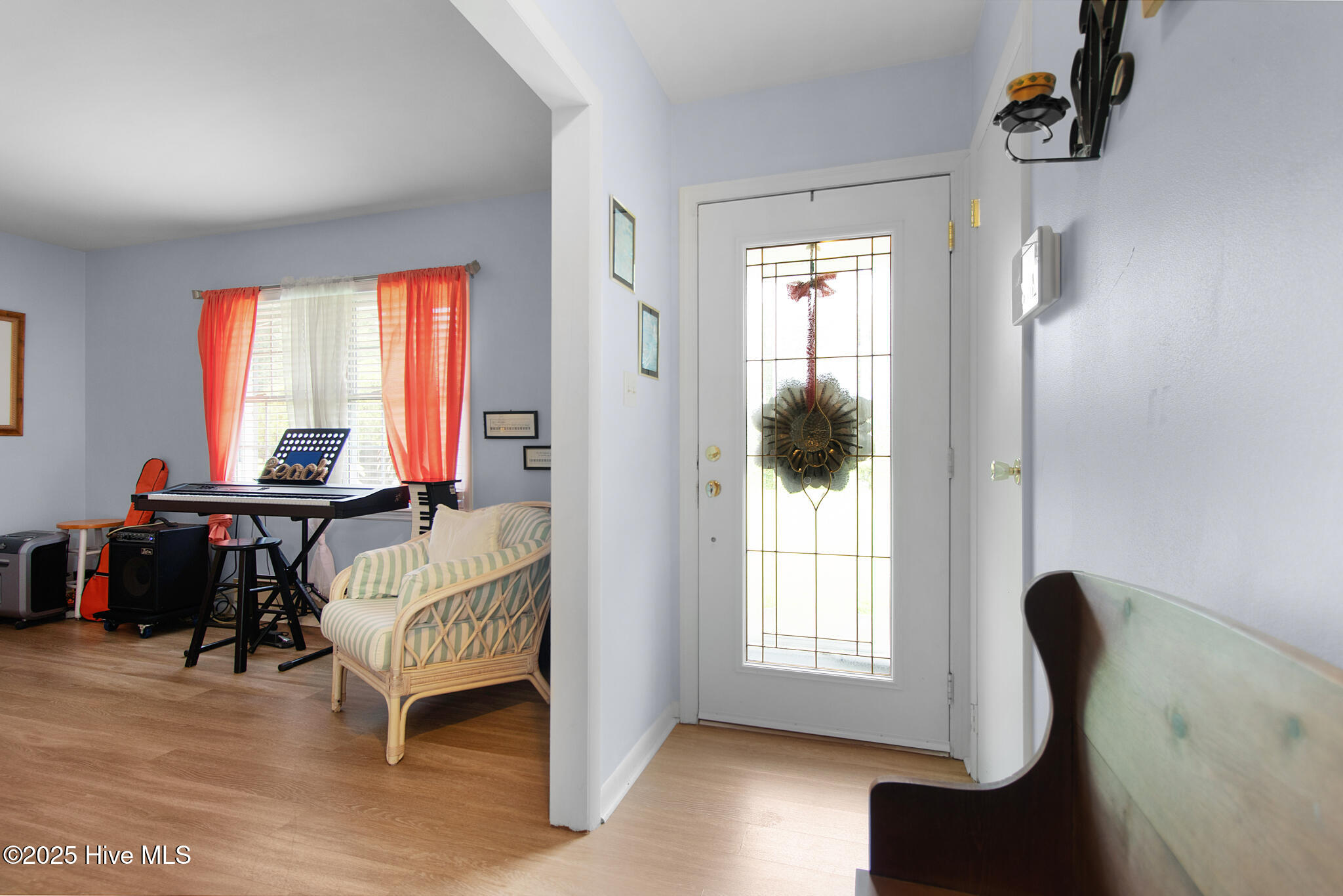 201 Queens Road Hubert, NC 28539 - Photo 14 of 59 Foyer entrance and sitting room