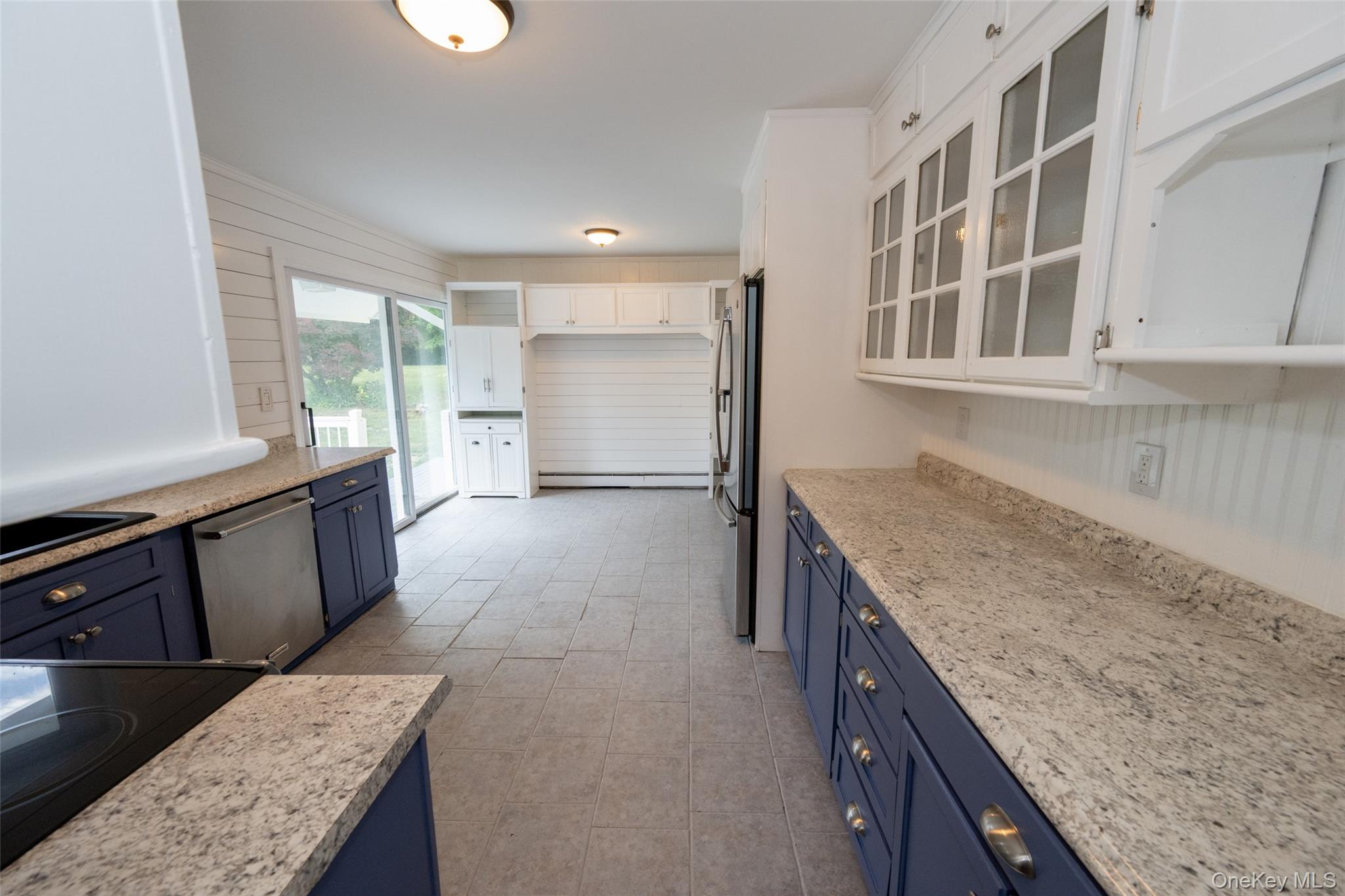 136 Foggintown Road Brewster, NY 10509 - Photo 12 of 50 a kitchen with granite countertop cabinets and window