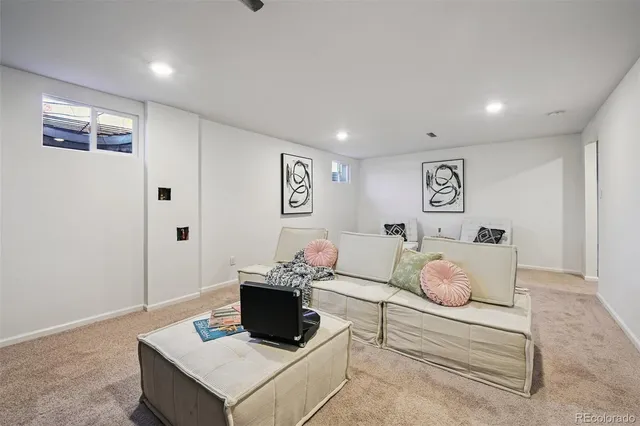 a living room with furniture and a table