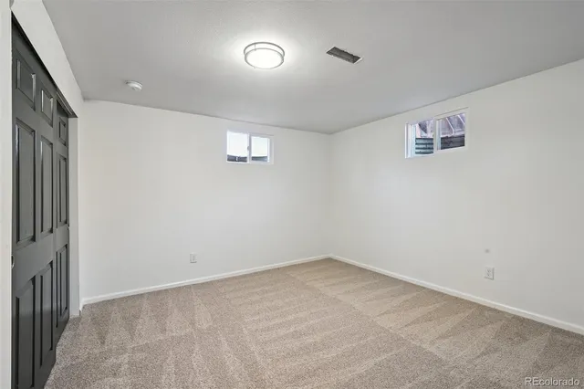 an empty room with a workbench