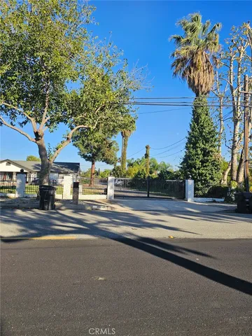 a view of street along with trees