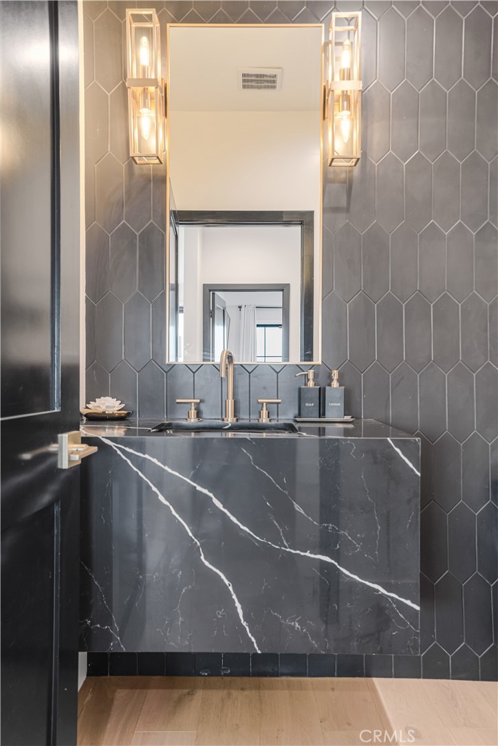 14614 Round Valley Drive Sherman Oaks, CA 91403 - Photo 14 of 35 a view of a kitchen with a sink and cabinets