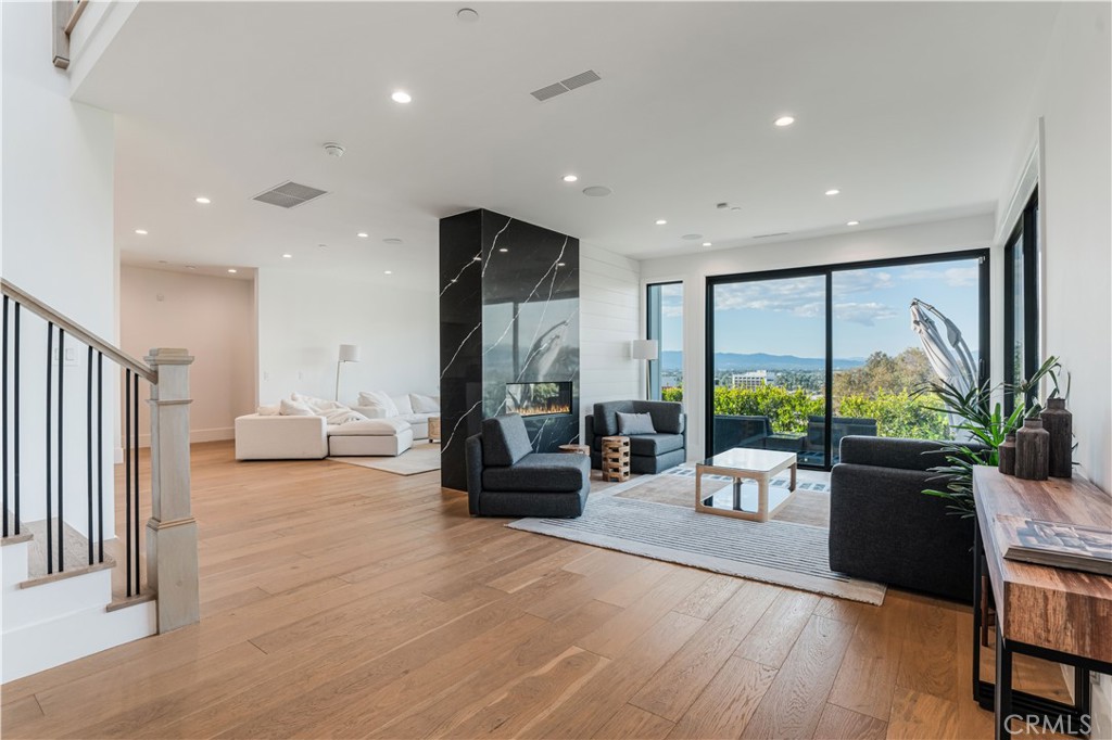 14614 Round Valley Drive Sherman Oaks, CA 91403 - Photo 2 of 35 a living room with furniture and a large window