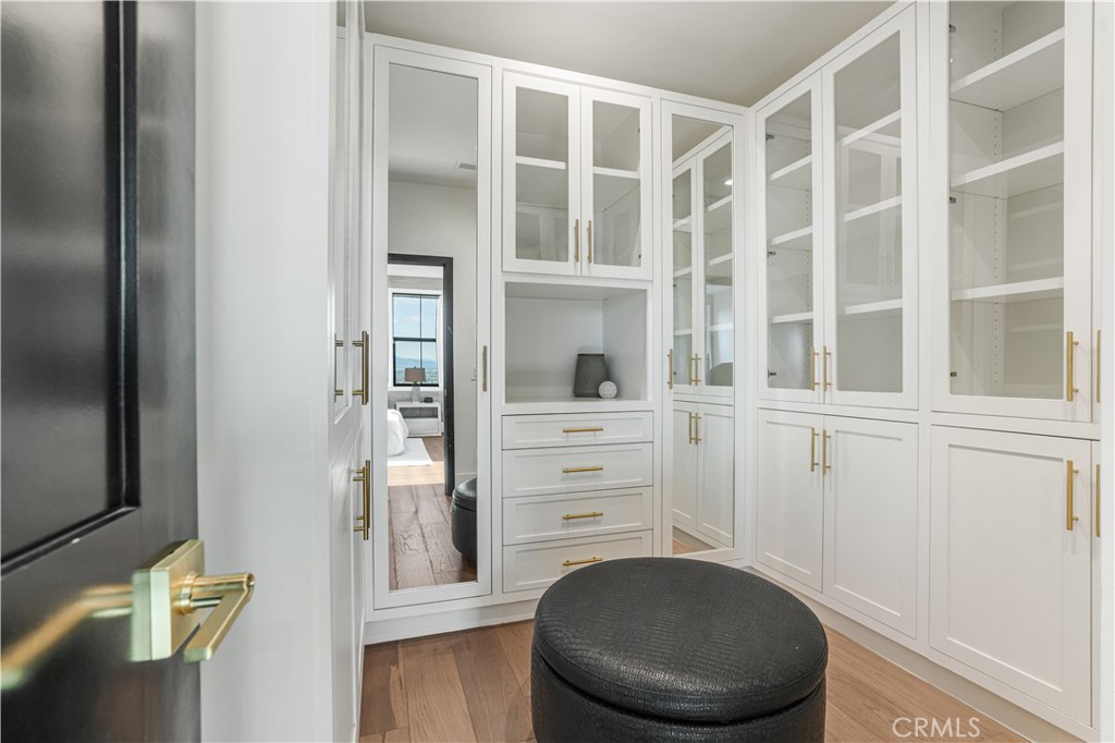 14614 Round Valley Drive Sherman Oaks, CA 91403 - Photo 25 of 35 a view of a bedroom with furniture and wooden floor