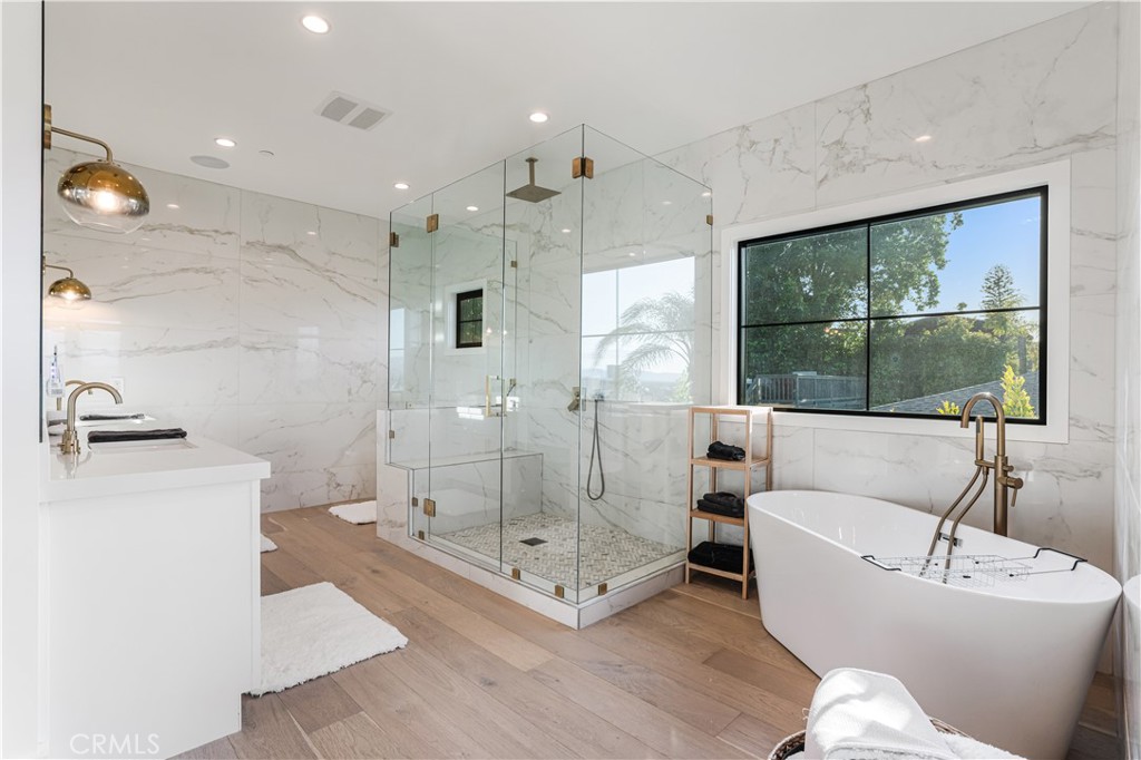 14614 Round Valley Drive Sherman Oaks, CA 91403 - Photo 26 of 35 a living room with a floor to ceiling window and a fireplace