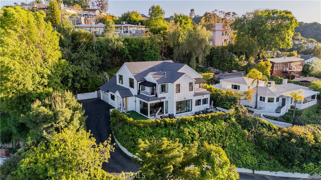 14614 Round Valley Drive Sherman Oaks, CA 91403 - Photo 34 of 35 a aerial view of a house with a big yard and large trees