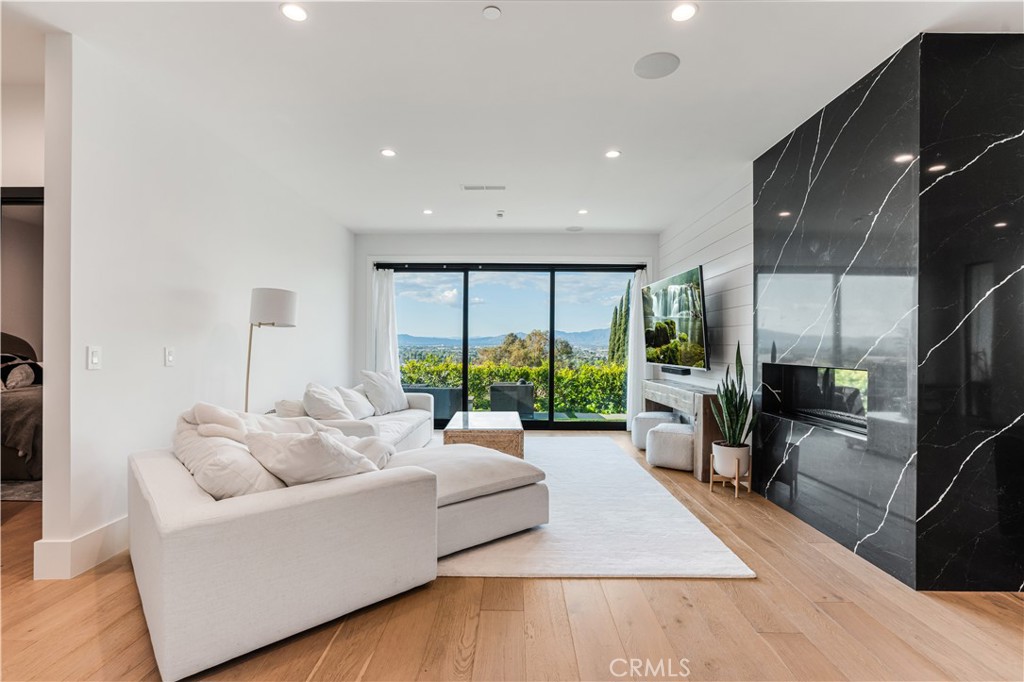 14614 Round Valley Drive Sherman Oaks, CA 91403 - Photo 4 of 35 a living room with furniture and a large window