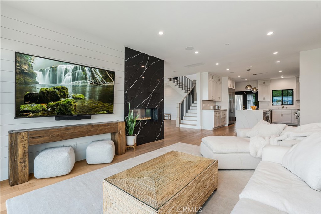 14614 Round Valley Drive Sherman Oaks, CA 91403 - Photo 5 of 35 a living room with furniture and a flat screen tv