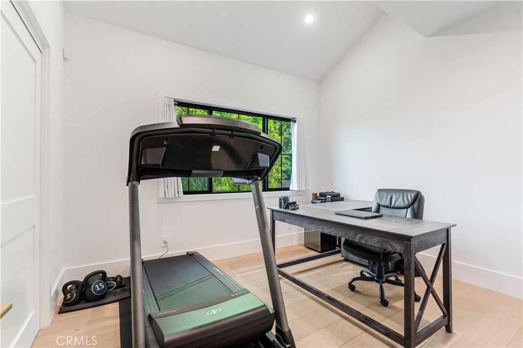 14614 Round Valley Drive Sherman Oaks, CA 91403 - Photo 10 of 35 a view of a workspace area with furniture and window