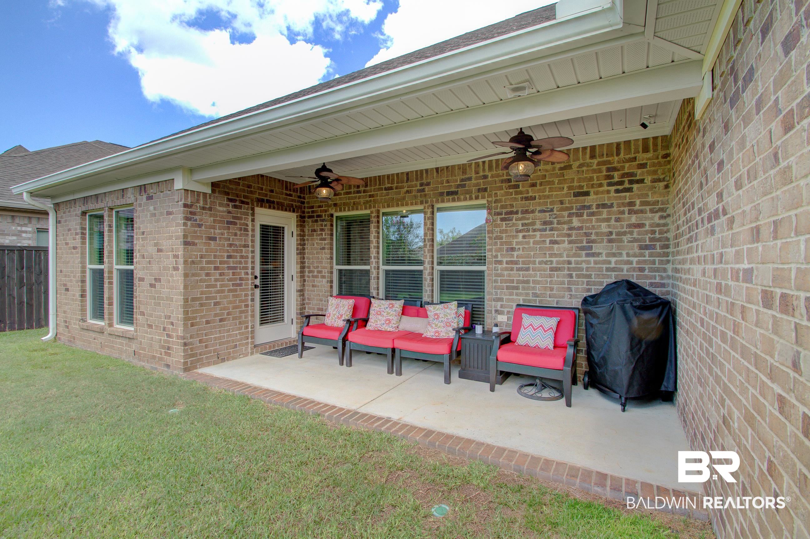 8625 Rosedown Lane Daphne, AL 36526 - Photo 22 of 29 View of patio featuring area for grilling and ceiling fan