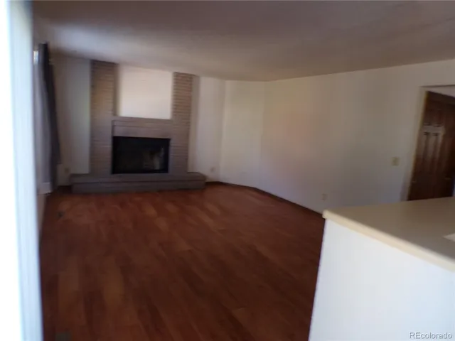 a bathroom with a sink mirror vanity and toilet