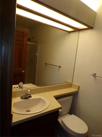 an empty room with wooden floor