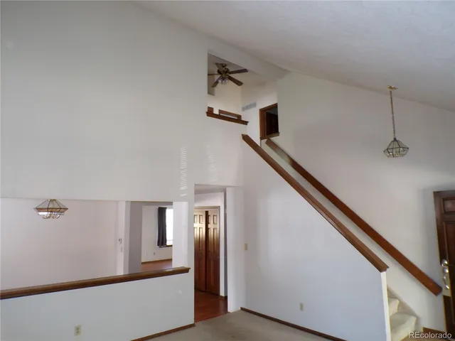a view of a hallway with entryway