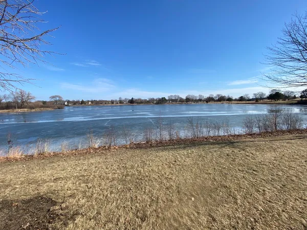 a view of a water with an outdoor seating