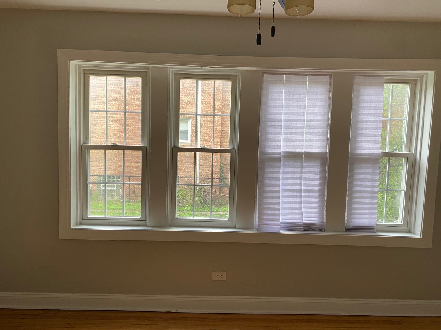 7822 South Kingston Avenue, Unit 1 Chicago, IL 60649 - Photo 12 of 15 a view of a livingroom with a window