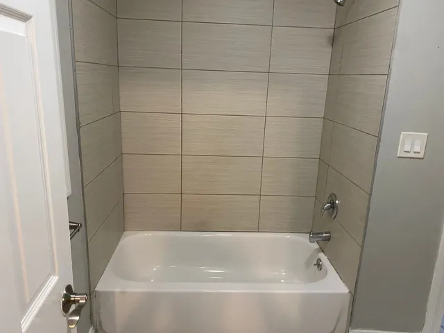 a bathroom with a bathtub