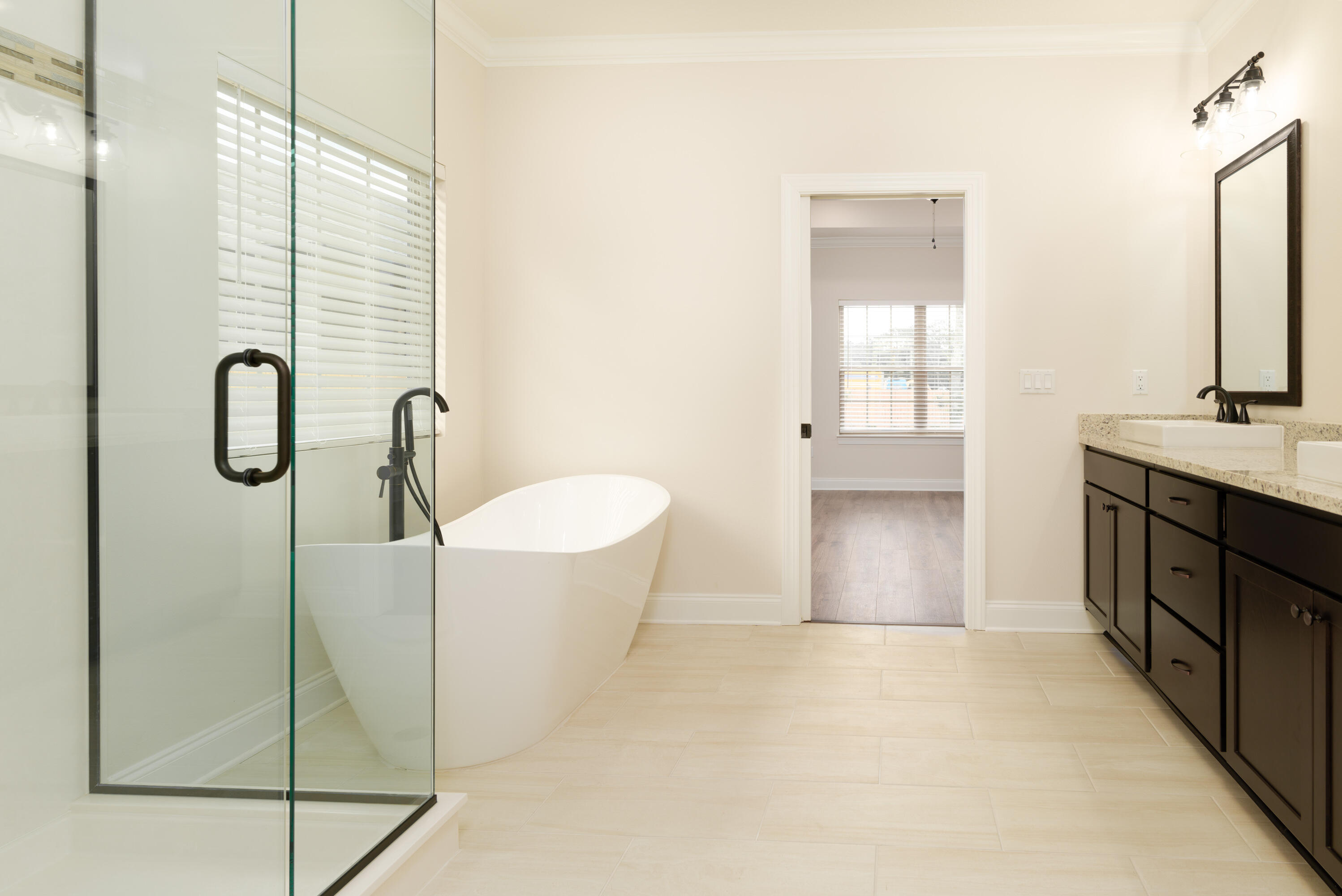 1184 Forest Heights Road Fort Walton Beach, FL 32547 - Photo 14 of 45 a bathroom with a tub sink and mirror