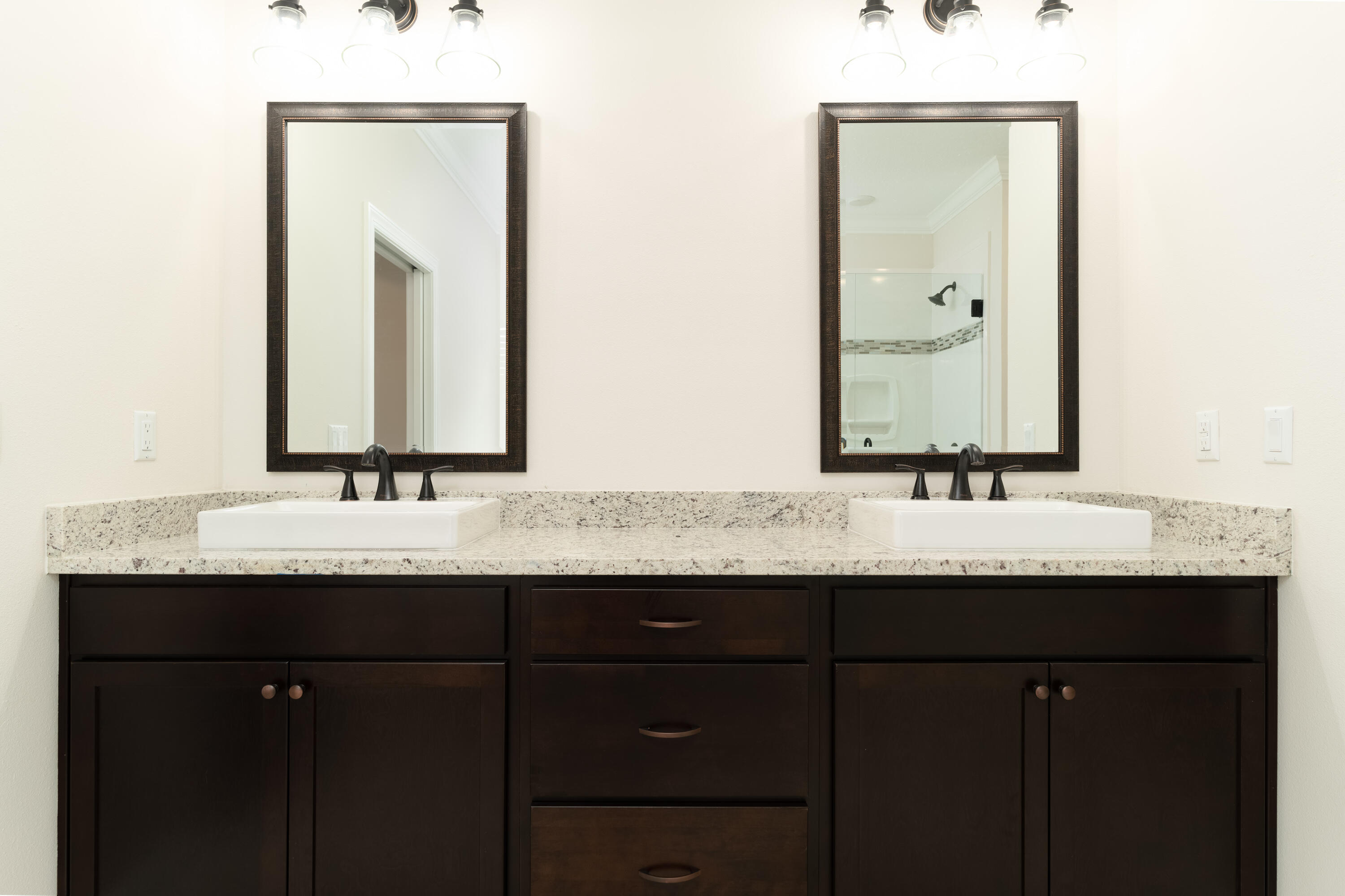 1184 Forest Heights Road Fort Walton Beach, FL 32547 - Photo 15 of 45 a bathroom with double sink and a mirror