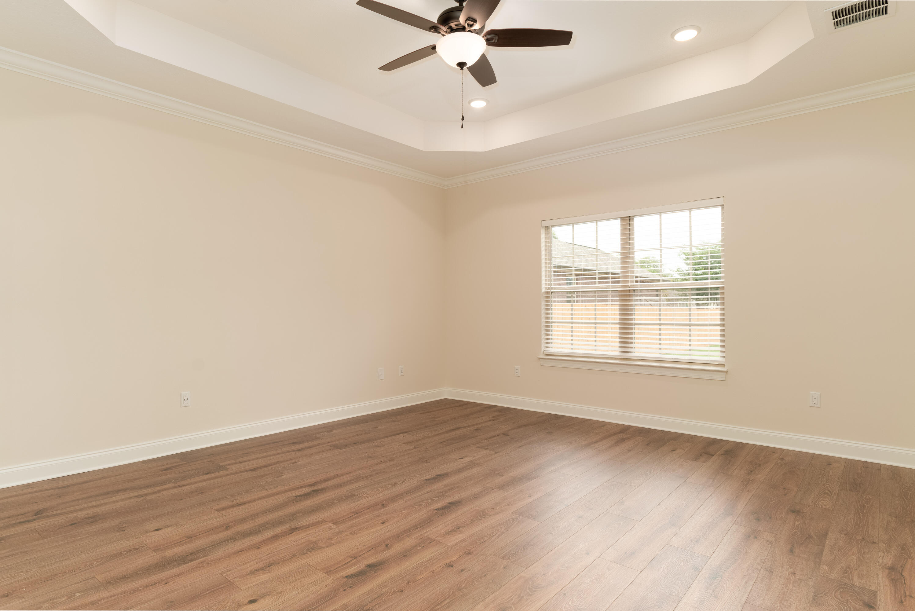 1184 Forest Heights Road Fort Walton Beach, FL 32547 - Photo 18 of 45 wooden floor in an empty room with a window