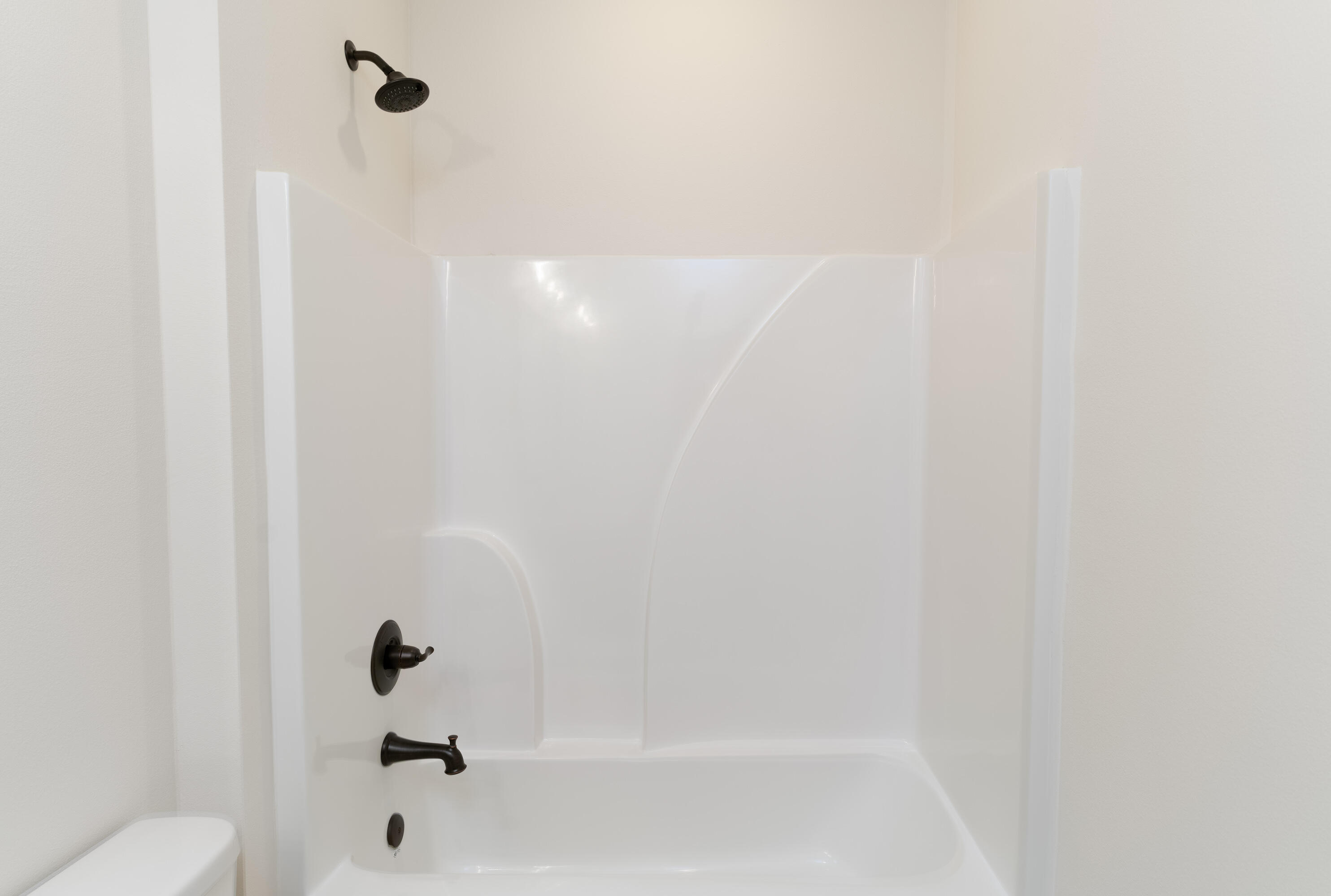 1184 Forest Heights Road Fort Walton Beach, FL 32547 - Photo 26 of 45 a bathroom with a bathtub