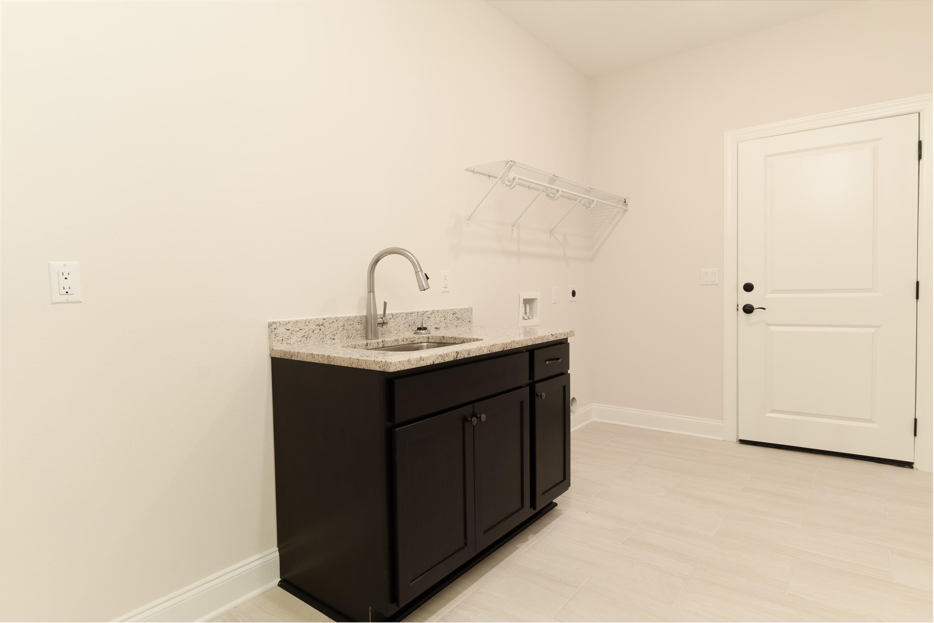1184 Forest Heights Road Fort Walton Beach, FL 32547 - Photo 27 of 45 a bathroom with a sink and a mirror