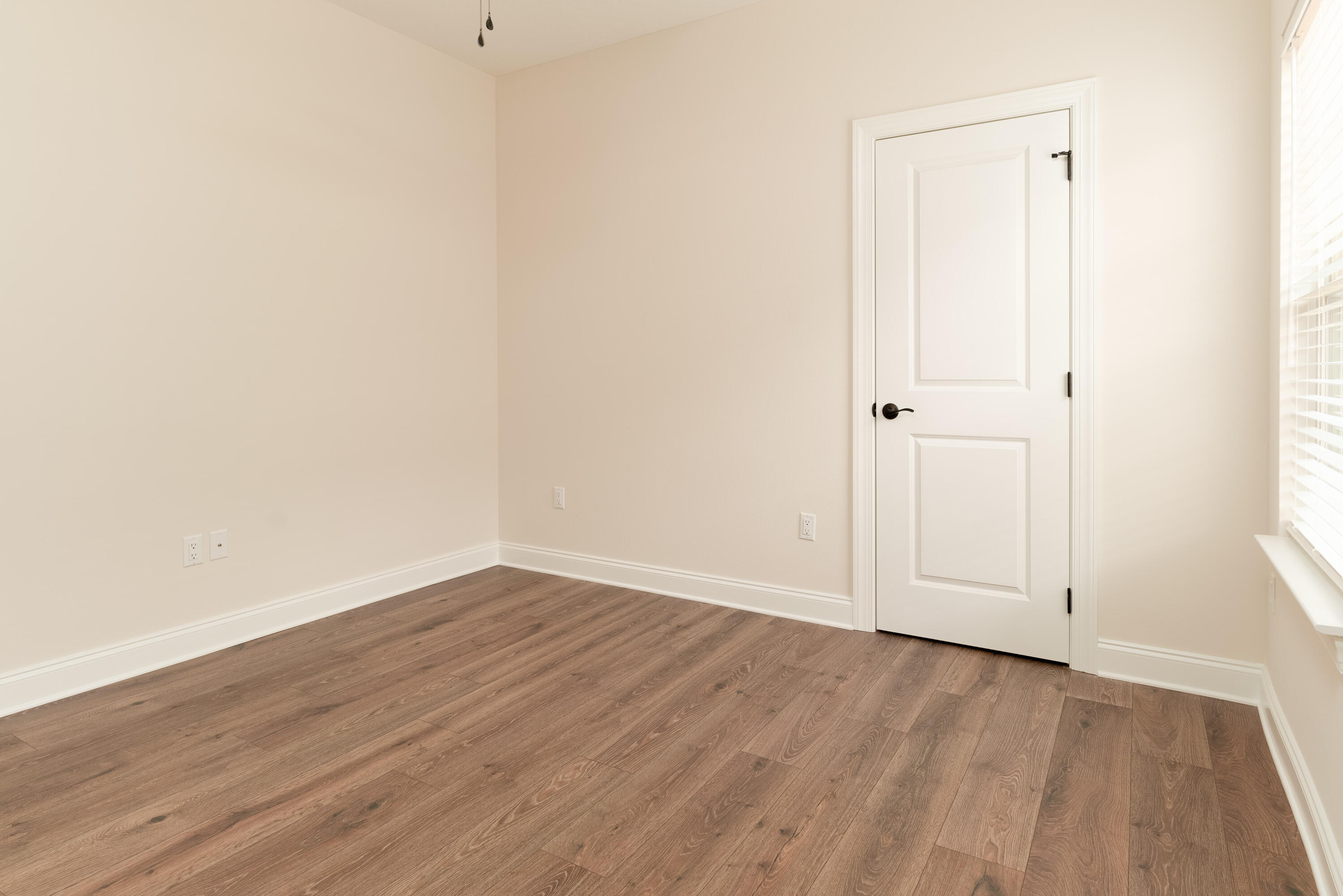 1184 Forest Heights Road Fort Walton Beach, FL 32547 - Photo 39 of 45 a view of an empty room with wooden floor