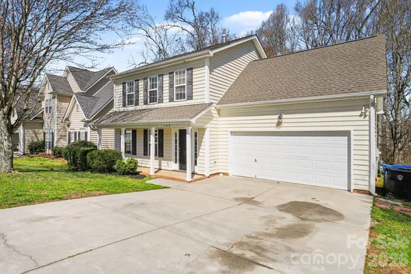 front view of a house with a yard