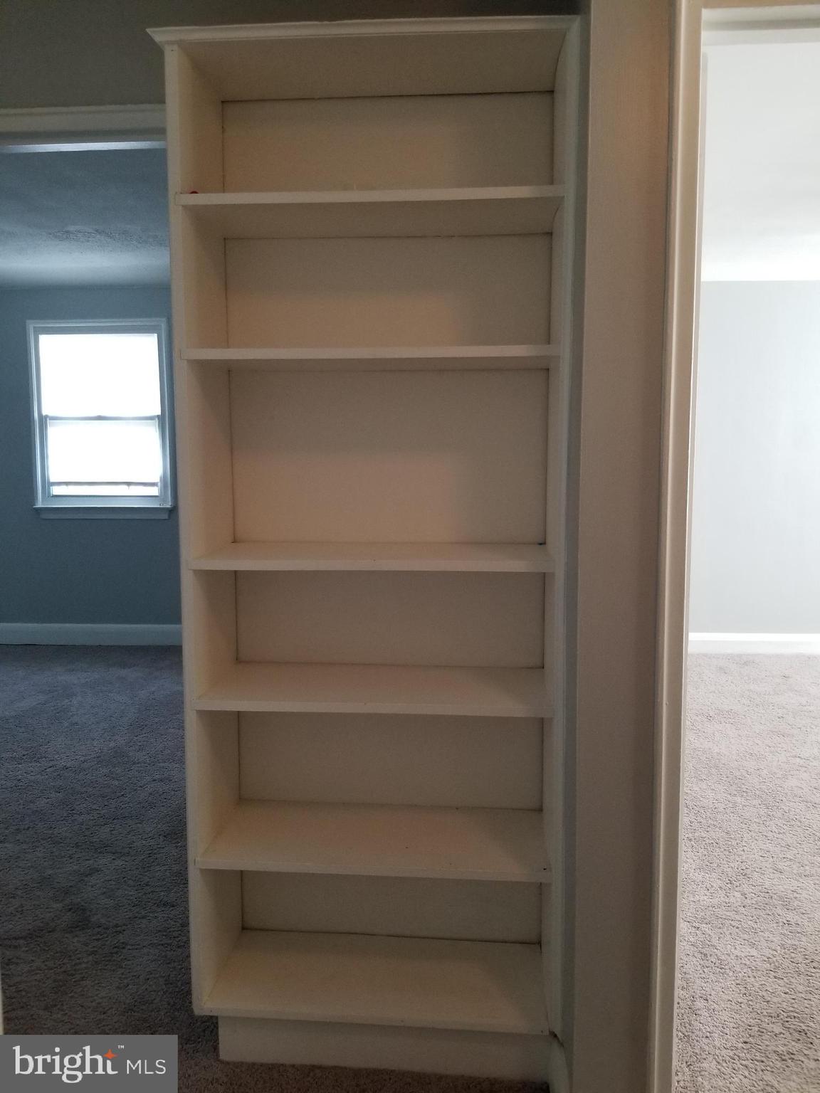 5735 Edgepark Road Baltimore, MD 21239 - Photo 18 of 33 Built-In Bookcase Upstairs