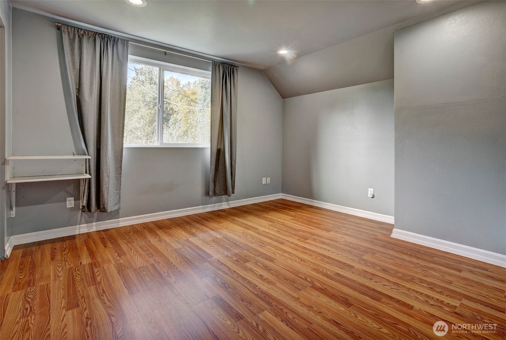 35904 Southeast 46th Street Fall City, WA 98024 - Photo 14 of 20 an empty room with wooden floor and sliding door