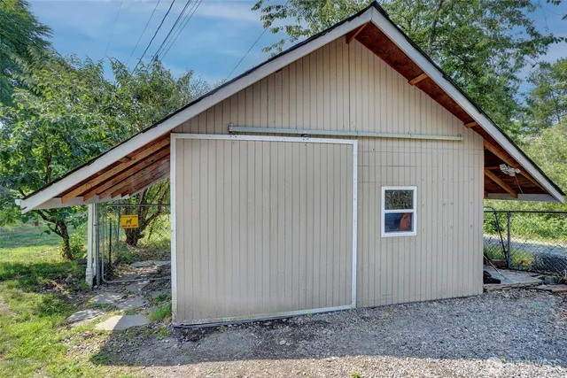 a backyard of a house with lots of green space