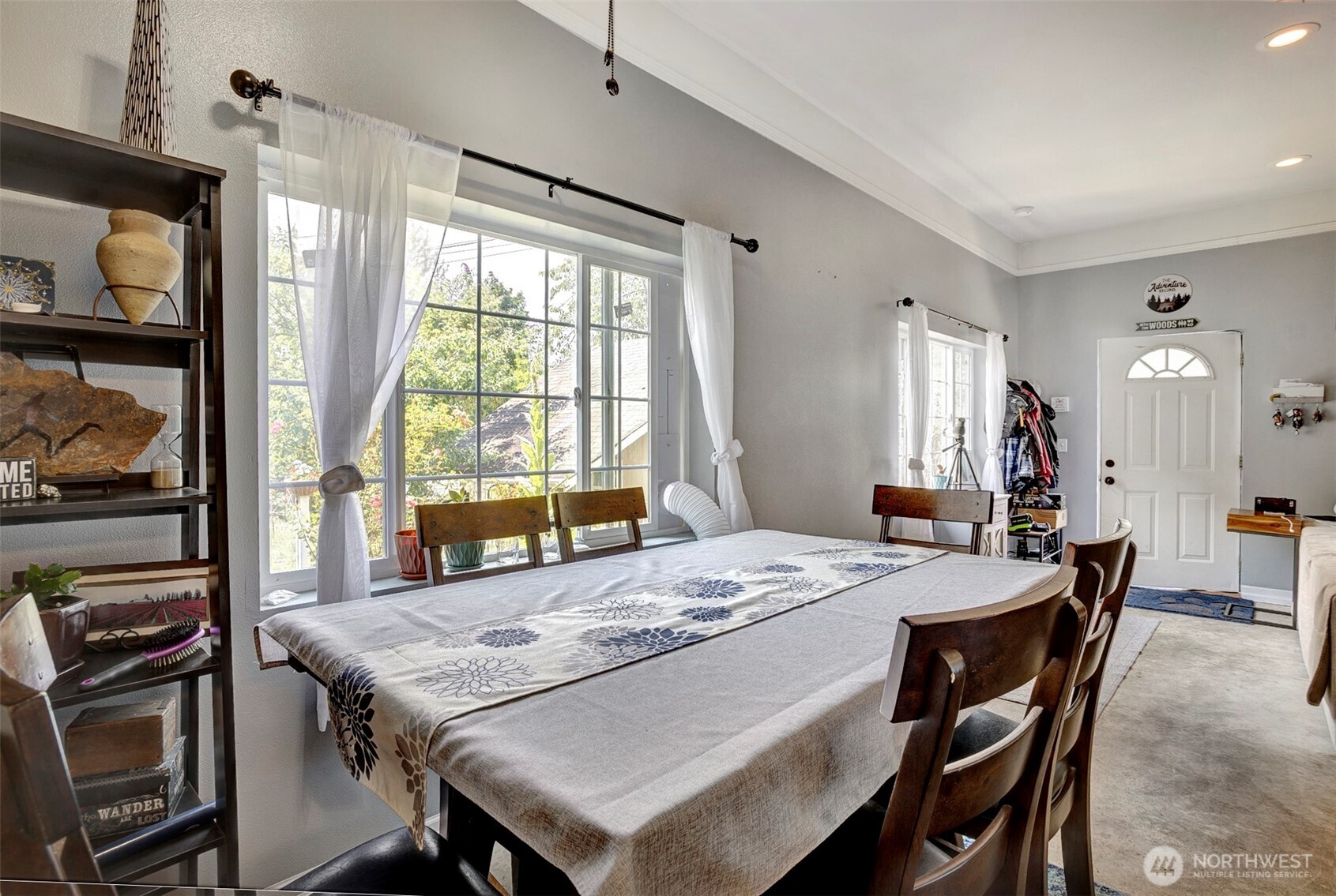 35904 Southeast 46th Street Fall City, WA 98024 - Photo 3 of 20 a dining room with a table chairs and kitchen view