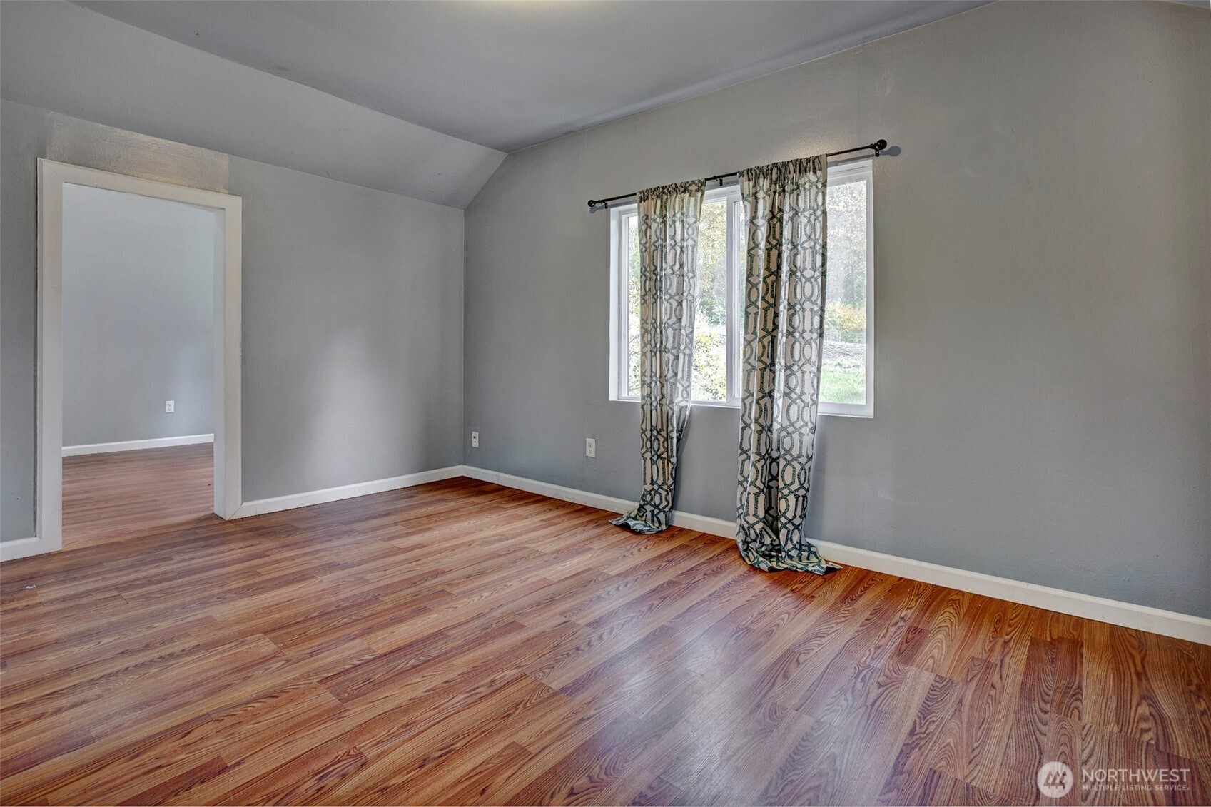 35904 Southeast 46th Street Fall City, WA 98024 - Photo 7 of 20 an empty room with wooden floor and windows