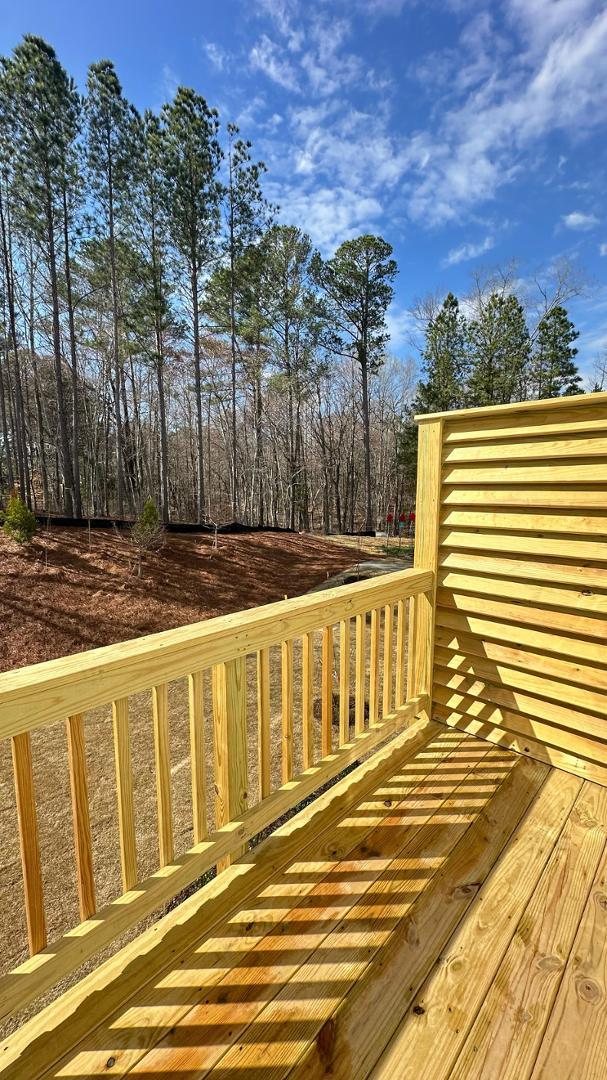 114 Red Brush Way Apex, NC 27539 - Photo 16 of 22 a view of a brick house with a ocean view