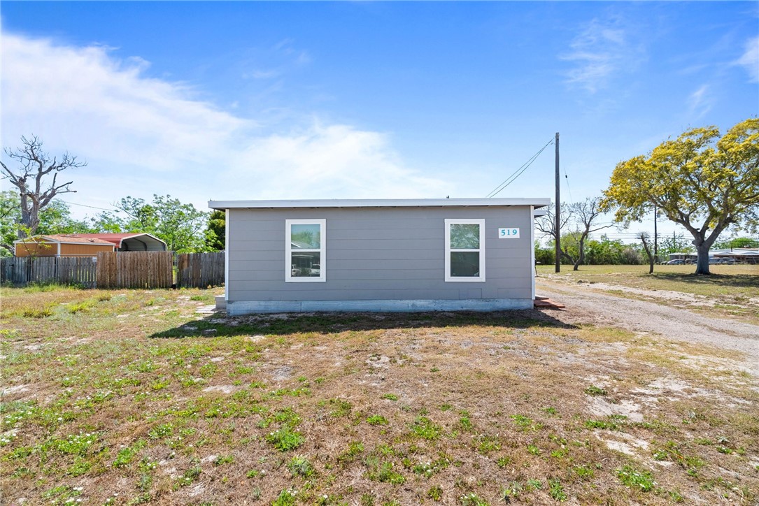 519 Claride Street Corpus Christi, TX 78418 - Photo 14 of 15 a view of a house with a yard