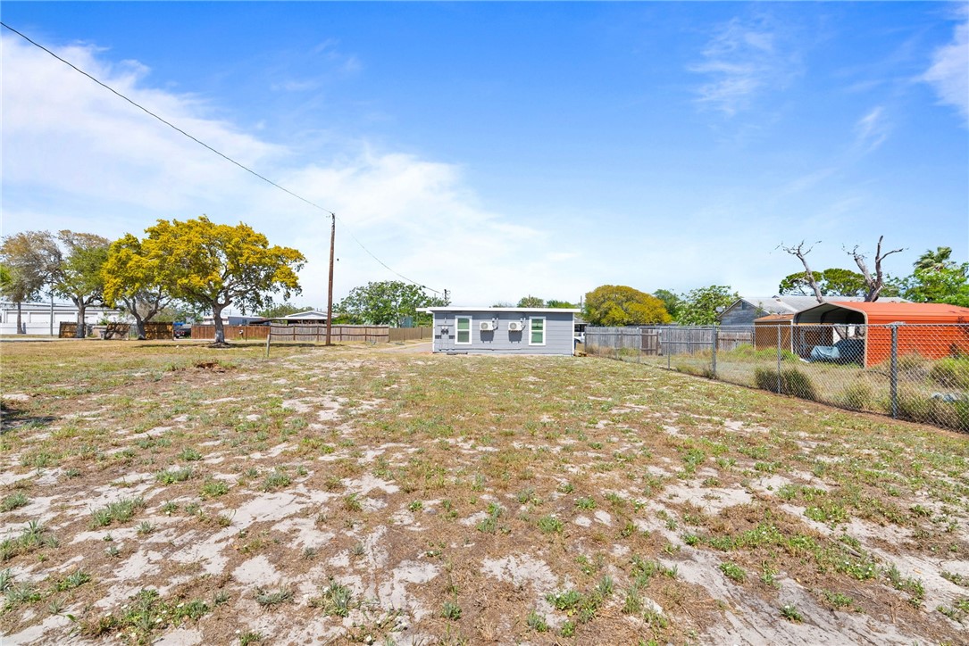 519 Claride Street Corpus Christi, TX 78418 - Photo 15 of 15 a view of a field with an trees