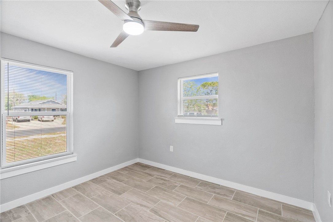 519 Claride Street Corpus Christi, TX 78418 - Photo 7 of 15 a view of room with window and ceiling fan