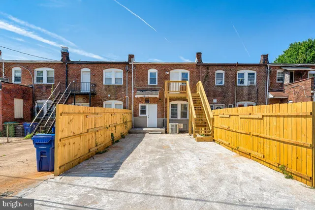 a view of a house with large outdoor space