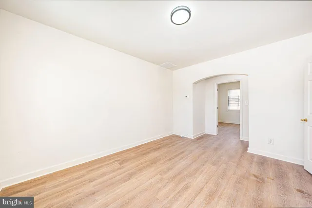 a view of a livingroom with wooden floor